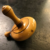 Toupie en buis à bouton - Toupies cadeau bel objet - Rouge et Noir