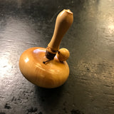 Toupie en buis à bouton - Toupies cadeau bel objet - Rouge et Noir